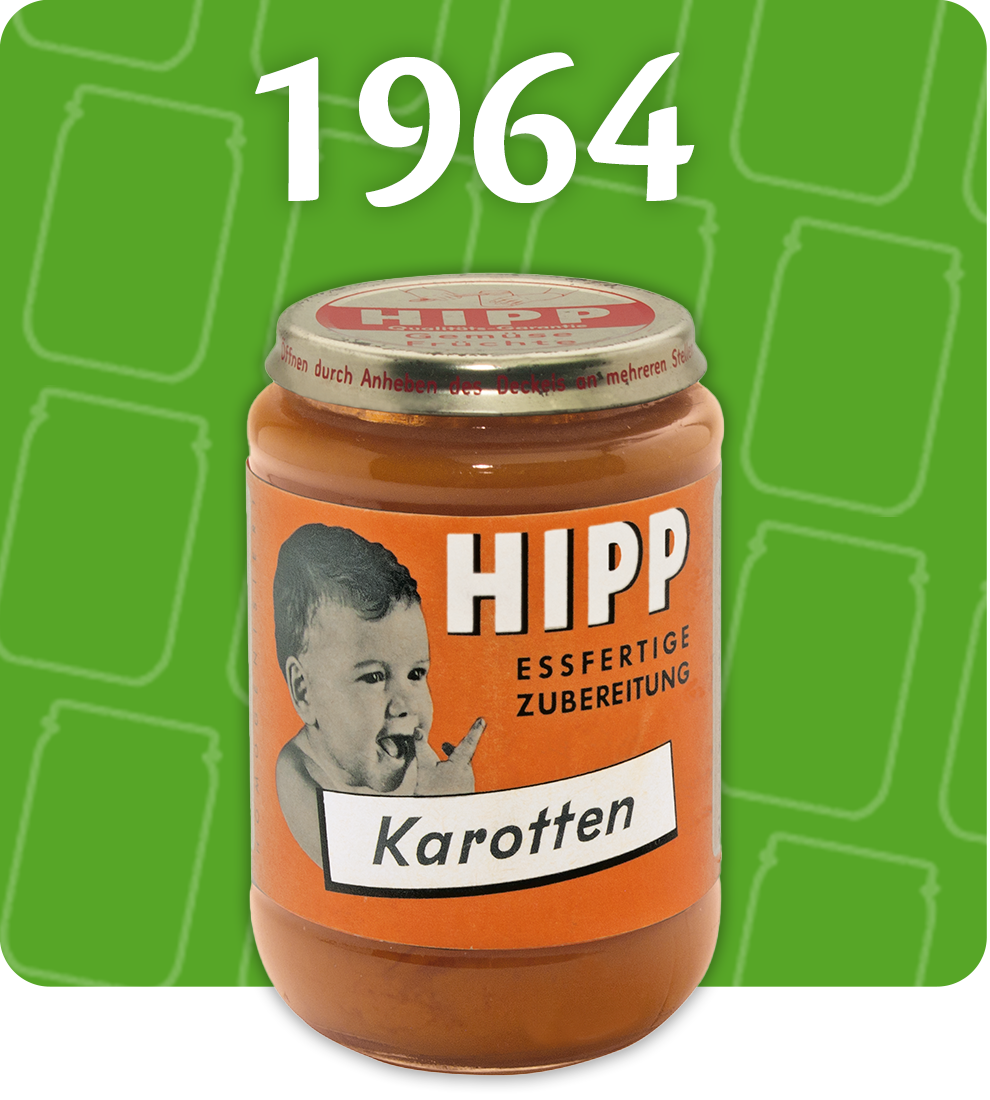 A jar labeled "HIPP" with a baby eating, set against a green background with the year "1964" written above.